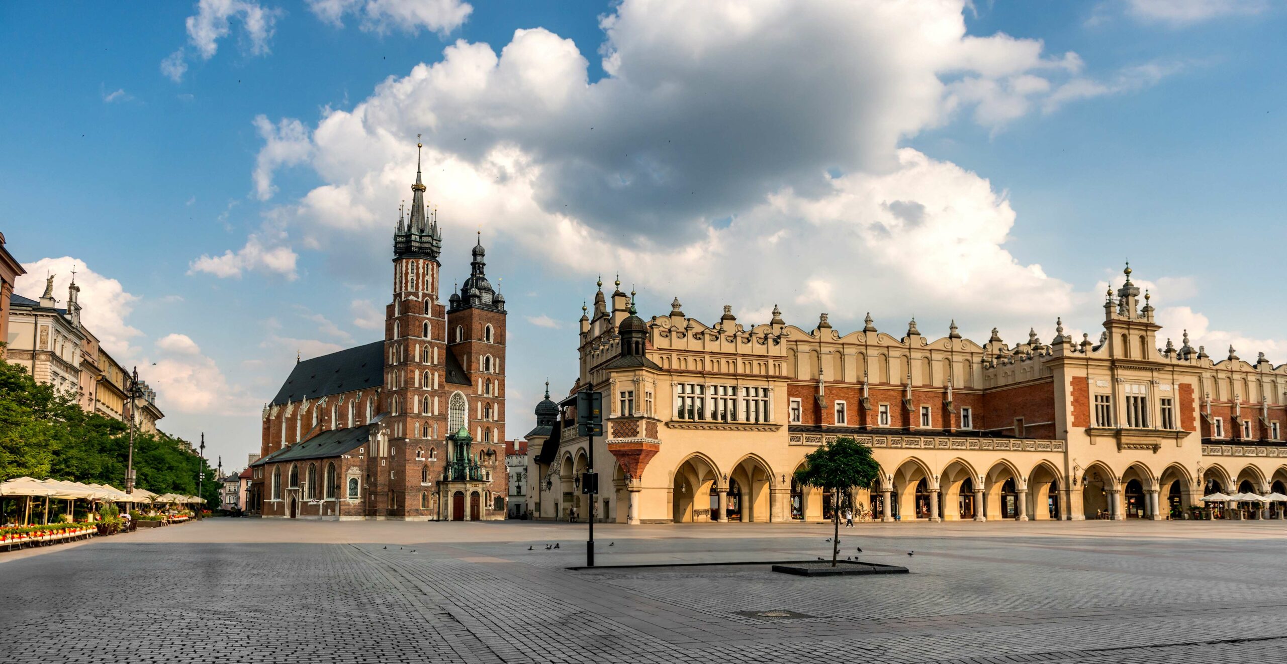 eastern european cobbled square in krakow poland scaled Cracow